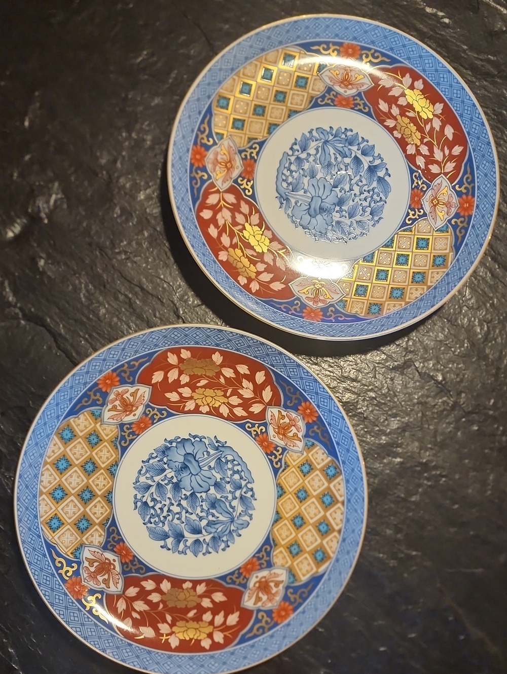 Two Porcelain Dinner Plates  with Blue Floral Center and Red & Gold Accents